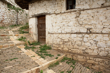 The famous old town of Berat in Albania. Picturesque street with houses from the Ottoman era. Beautiful landscape in central Albania.