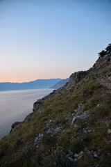 Beautiful rough blue sea with waves and sandy beach. Beautiful day in Greece	
