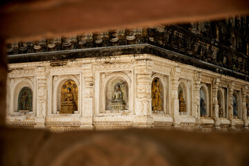 Form of budhha, Art on wall, Mahabodhi Temple, Mahābodhi Mahāvihāra, UNESCO World Heritage Site, Buddhist temple in Bodh Gaya, Bihar, India
