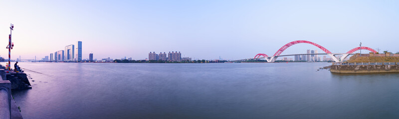Guangzhou Pearl River Red Bridge and Riverside City Tall Buildings