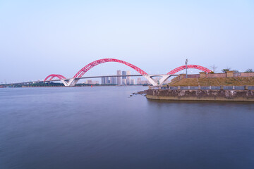 Guangzhou Pearl River Red Bridge and Riverside City Tall Buildings