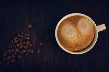 cup of coffee with beans