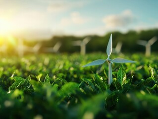 Close-up of a small wind turbine in a green field with larger turbines in the background, representing renewable energy and sustainability.