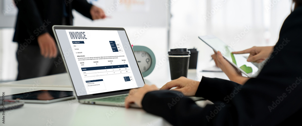 Poster invoice on computer screen from accounting application. computer program for financial and budget of