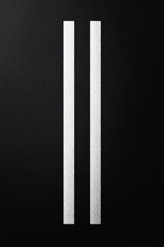 black background with white parallel lines