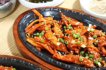 korea food. grilled deodeok root, mountain herb whose roots have restorative properties