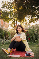 Woman freelancer working at computer in nature