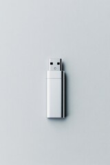 silver USB flash drive on a minimalist background