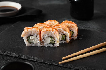 Elegant Shrimp and Cucumber Roll on Slate Plate with Dark Minimalist Background