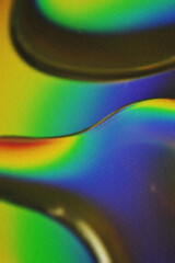 Blurred abstract iridescent fluid liquid background. Trendy texture with polarization effect and colorful neon holographic stains. Abstract vertical background grain texture for design as banner, ads