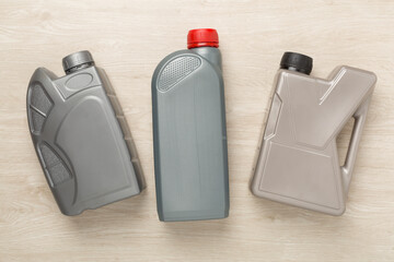 Automobile products and tools on wooden background, top view