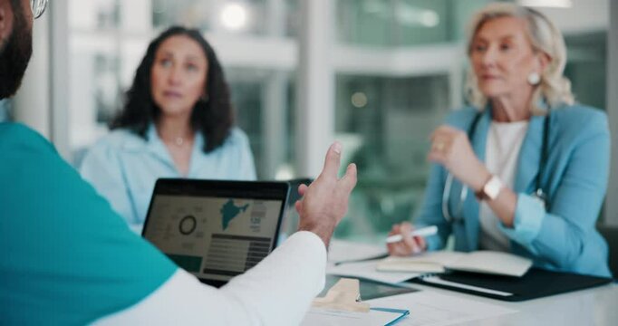 Data, healthcare and laptop with people in boardroom of hospital for meeting, planning or research. Doctors, information and nurses with professional medicine group in clinic for education or review