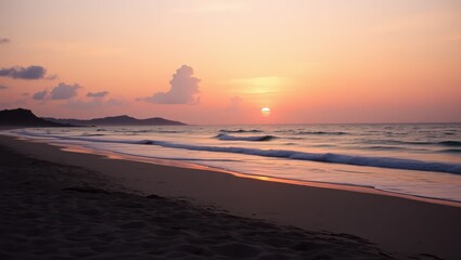 Obraz premium Golden Hour Sunset Over Sandy Beach and Ocean Waves