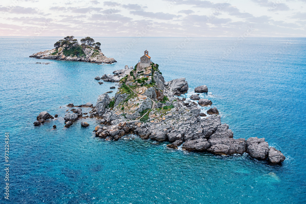 Wall mural scenic beauty of montenegro with a drone shot of sveta nedjelja and katic islands near petrovac, sho