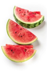 Fresh watermelon slices arranged on a clean white surface