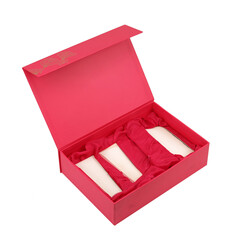 Minimal product background for Christmas, New year and sale event concept. Pink gift box with ribbon bow on pink background.