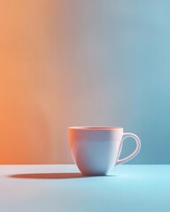 Obraz premium Modern coffee cup on a minimalistic table with pastel blue and orange backdrop in studio lighting