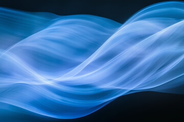 Abstract flowing blue wave pattern with smooth, flowing lines and dynamic light effects, evoking a sense of calm, movement, and fluidity in a modern digital design