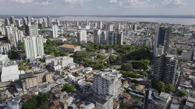 Drone orbits to the right high over west side of Pra&ccedil;a da Rep&uacute;blica, facing the Teatro da Paz in Bel&eacute;m, Par&aacute;, Brazil
