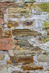 Brown and Yellow sandstone and mortar wall background texture ideal graphic design element