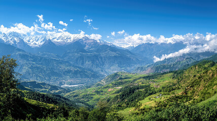 Obraz premium Breathtaking panoramic view of mountain range with snow capped peaks and lush valleys