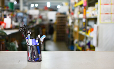 pens on a warehouse counter