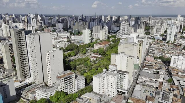 Drone flies between large buildings and into Pra&ccedil;a da Rep&uacute;blica and stops in front of Teatro do Paz in Bel&eacute;m, Par&aacute;, Brazil