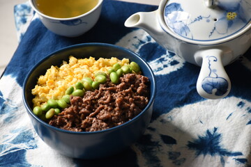 Three Colours Rice Bowl, Sanshoku (Soboro) Don is a combination of minced meat, egg and green vegetables. Delicious and healthy Japanese dish.