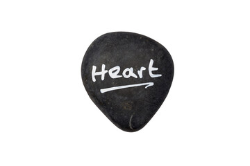 Heart: Inspirational word in white paint on heart shape black stone, isolated on white background