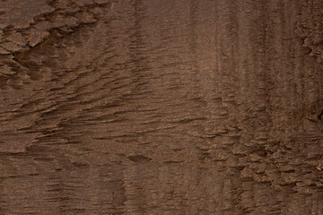 Sawn brown wooden plank texture background, ideal as graphic design element
