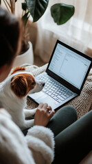 Woman working from home with dog by her side, cozy home office scenes with pets