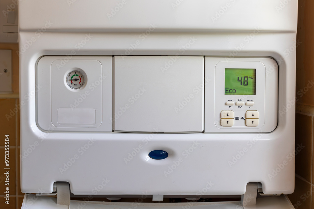 Wall mural cost of living crisis concept: open gas boiler control panel to turn down boiler temperature