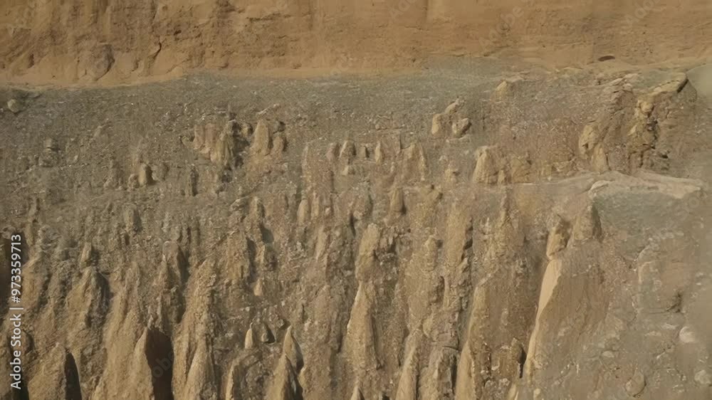 Poster Wind and water have eroded the sandstone rock formations over many years, creating an abstract pattern of peaks and valleys