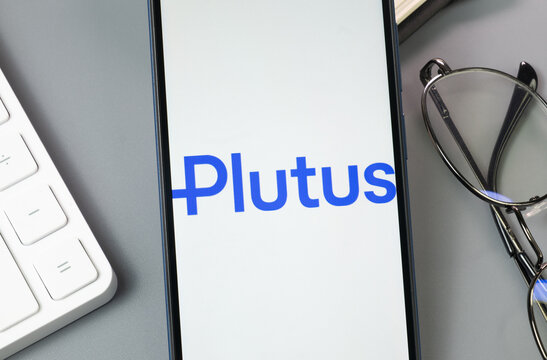 New York, USA - 30 August 2024: Plutus Logo on Phone Screen, Company Icon on Display