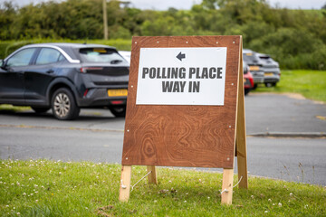 Democracy Election Voting Polling Place Way-In with direction arrow sign outside polling station