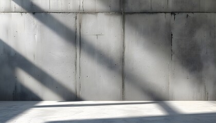 Abstract interplay of light and shadow on a textured white and grey concrete wall