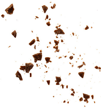 Small pieces of broken chocolate on a white or transparentn  background.Used for gourmet confectionery advertisements.
