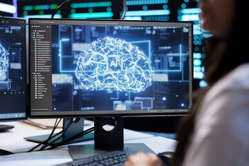 Admin using AI tech on computer to do checkup in server room providing storage. Close up shot of IT...