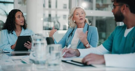 Coaching, healthcare and meeting with people in boardroom of hospital together for planning or research. Doctors, nurses and teamwork with professional medicine group in clinic for medical education