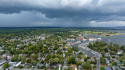 Late summer, early fall aerial, drone, photo of the St Michaels Maryland skyline and the Chesapeake...