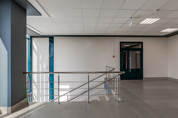 Obraz premium stairs emergency and evacuation exit stair in up ladder in a new office building