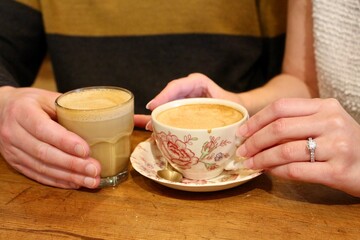 Person with a cup of coffee