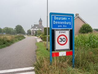 Place name sign of the village of Deursen-Dennenburg, municipality of Oss, the Netherlands, with...