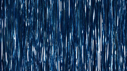 shimmering straight tinsel garland curtain texture in a solid metallic indigo color