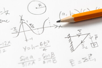 Mathematical Equations and Graph with Pencil