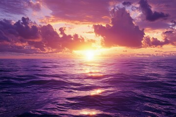 Obraz premium Purple Sunset Over a Calm Sea