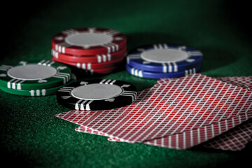 Dark scene of cards, chips, gambling, poker, blackjack, Las Vegas, Texas Hold 'Em