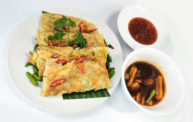 Crispy Egg Martabak with Spicy Sauce and Pickled Vegetables 