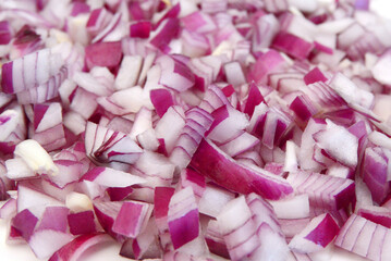 Stack red onion on white background