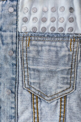 Close-up of blue denim jeans texture with visible pockets, showcasing casual fashion detail
